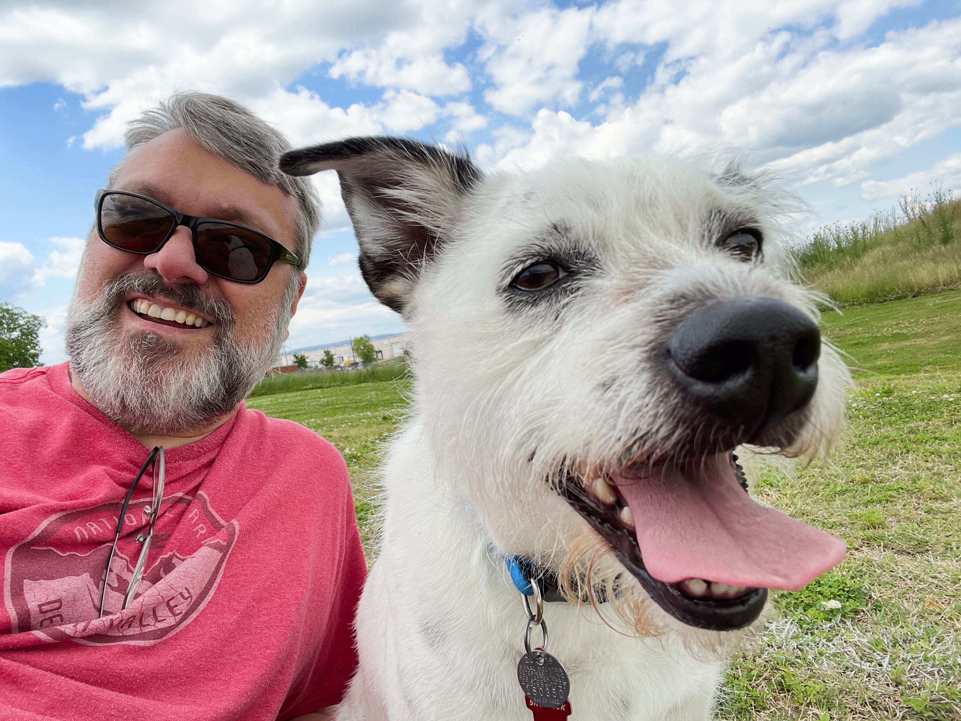 photo of man with a dog